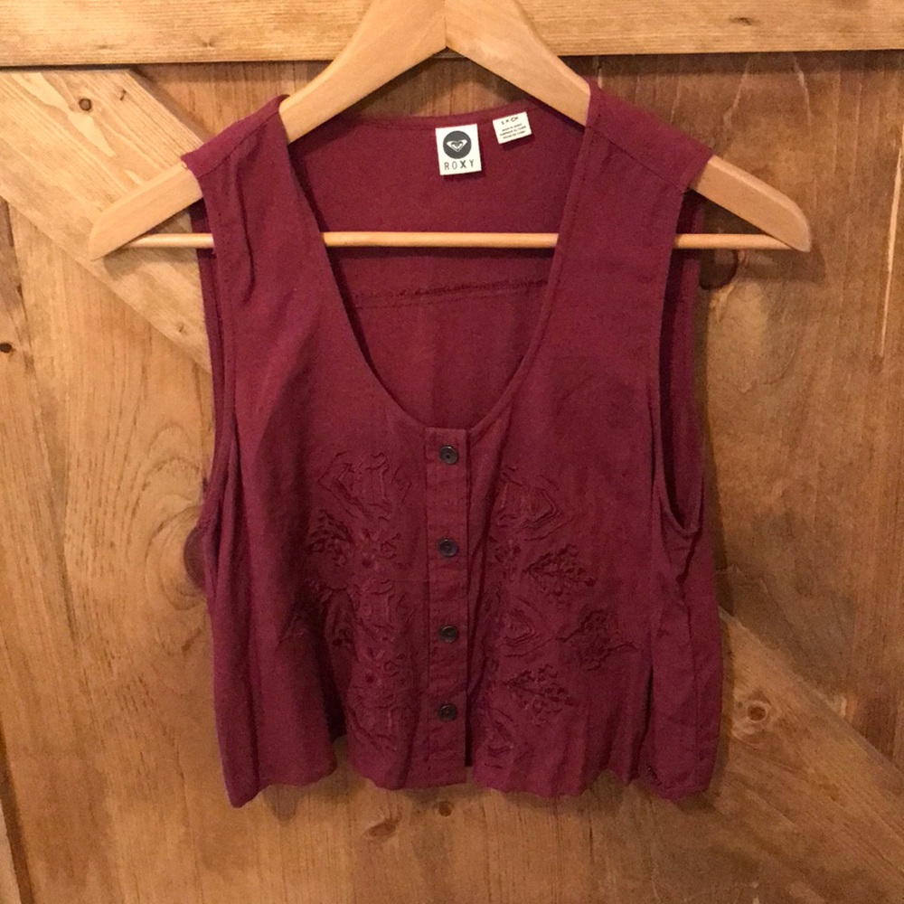 Maroon tank top.